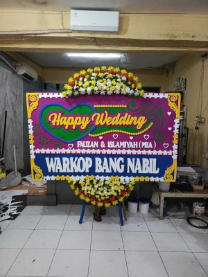 Papan Bunga di Lugu Butuh